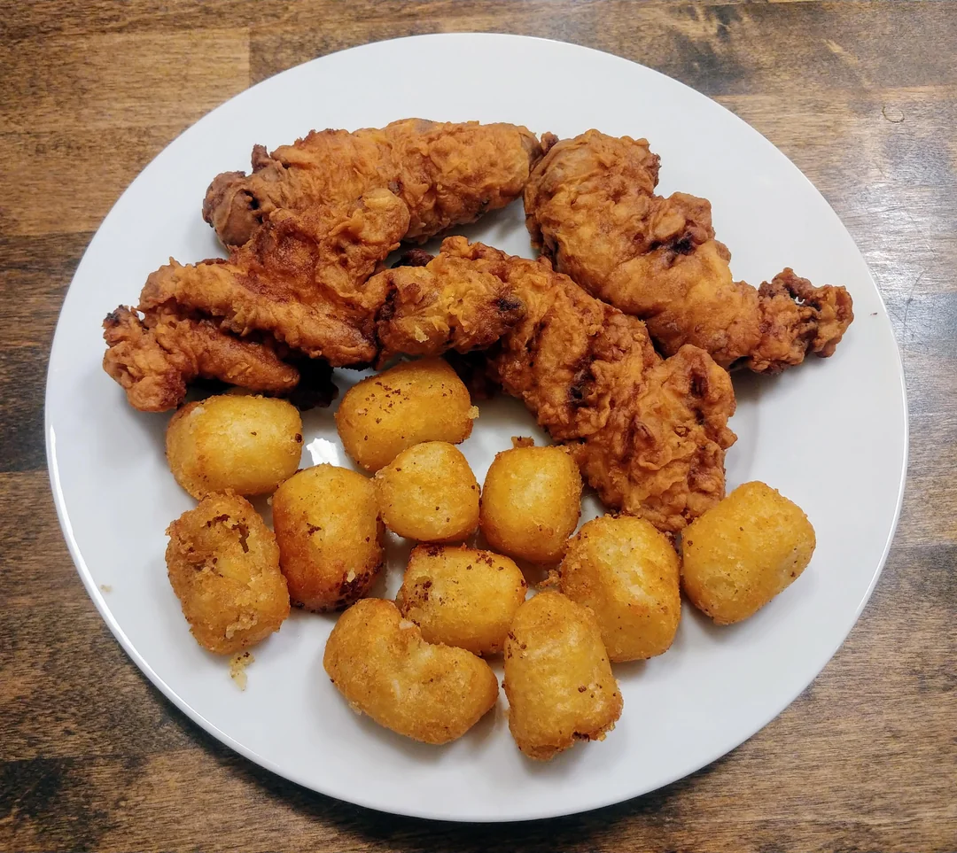 CHICKEN FINGERS: includes tater tots & fruit
